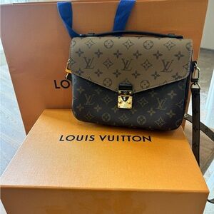 Authentic Louis Vuitton Reverse Monogram Pochette Métis